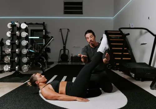Personal trainer with client