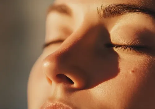 Lady with sun shinning on her face
