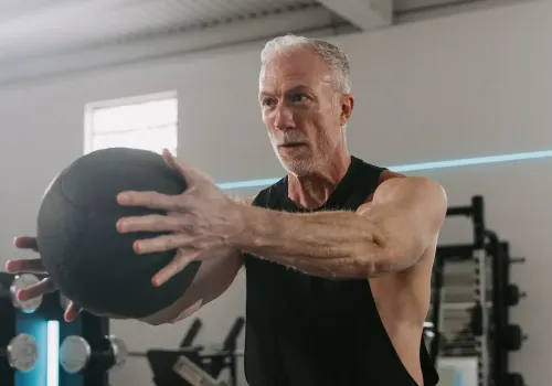 Man with workout ball