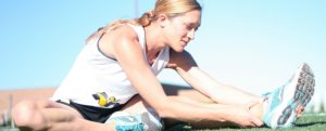 Woman Stretching Muscles Chiropractic Care Driven Fit Studio