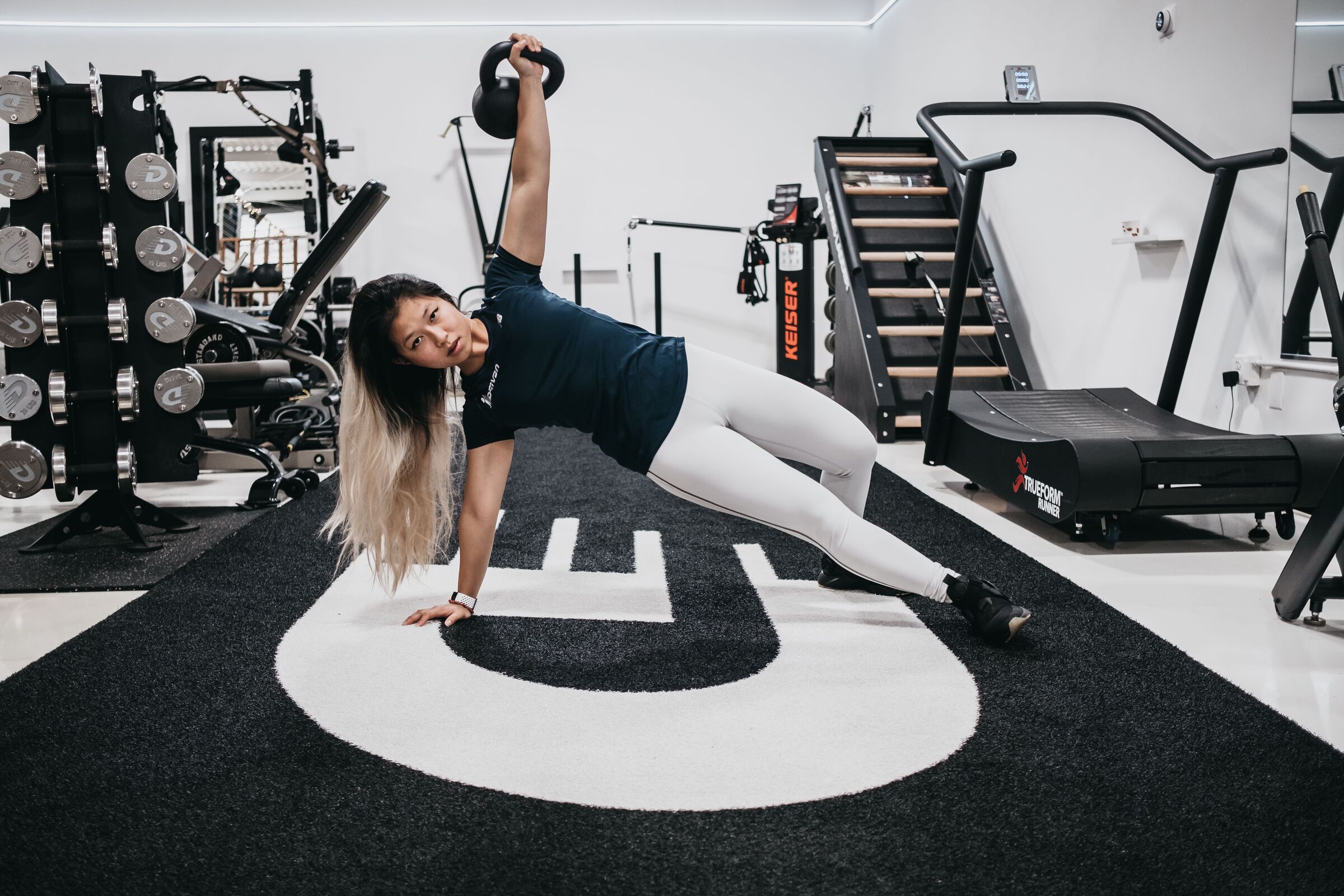 trainer kim working out with kettlebell